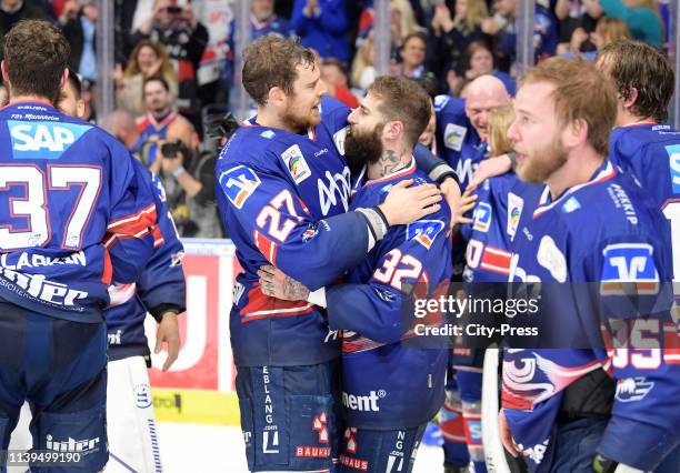 Brendan Mikkelson and Cody Lampl of the Adler Mannheim after the game between the Adler Mannheim and the EHC Red Bull Muenchen at the SAP Arena on...