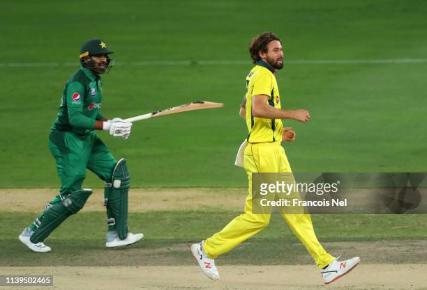 Kane Richardson of Australia looks on during the 5th One Day International match between Pakistan and Australia at Dubai International Stadium on...