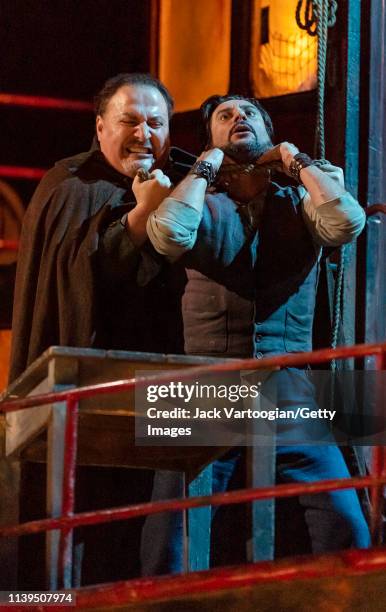 Georgian baritone George Gagnidze and Argentinian tenor Marcelo Alvarez perform during the final dress rehearsal prior to the season revival of the...