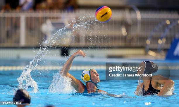 Bronwen Knox of Australia lobs the ball over the top of Kiley Neushul of the United States of America during the 2019 FINA World League...