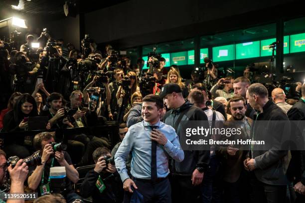 Comedian and leading Ukrainian presidential candidate Volodymyr Zelenskiy plays awaits voting results at his election night gathering on March 31,...