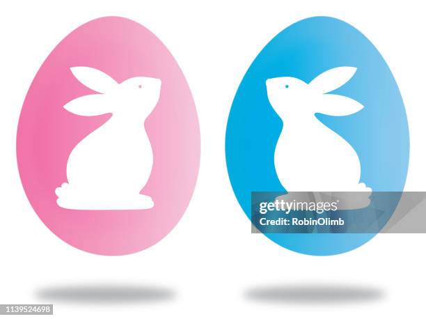 pink and blue easter bunny eggs - hard boiled egg stock illustrations