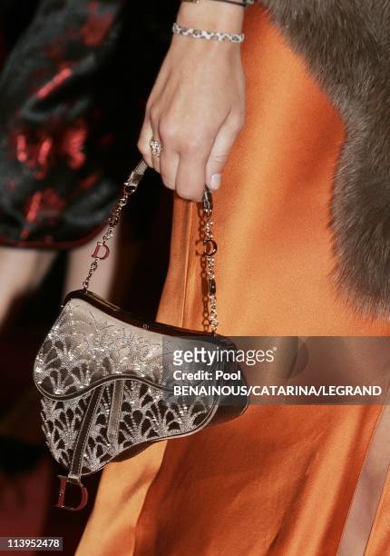 58th Cannes Film Festival: Illustration Fashion on the red carpet in Cannes, France On May 18, 2005-Melita Toscan du Plantier wearing a Dior saddle...
