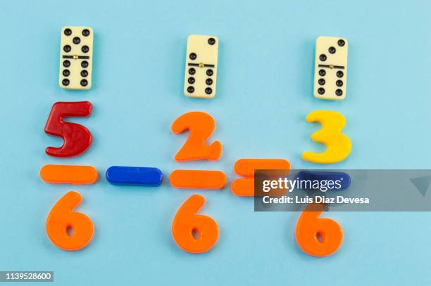 learn subtract fractions using dominoes - fractions bildbanksfoton och bilder