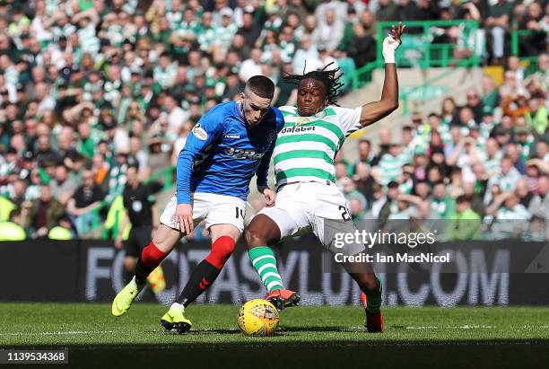 Ryan Kent of Rangers evades Dedryck Boyata of Celtic on his way to scoring during The Ladbrokes Scottish Premier League match between Celtic and...