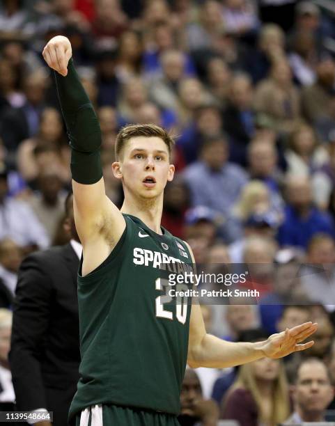 Matt McQuaid of the Michigan State Spartans attempts a shot against the Duke Blue Devils during the first half in the East Regional game of the 2019...