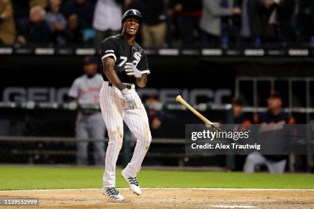 Tim Anderson of the Chicago White Sox throws his bat after hitting a walk off home run in the ninth inning to beat the Detroit Tigers at Guaranteed...