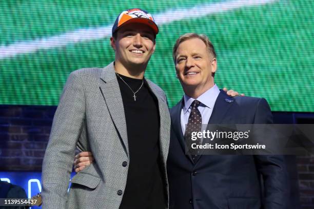 Missouri quarterback Drew Lock and NFL Commissioner Roger Goodell during the second round of the 2019 NFL Draft on April 26 at the Draft Main Stage...