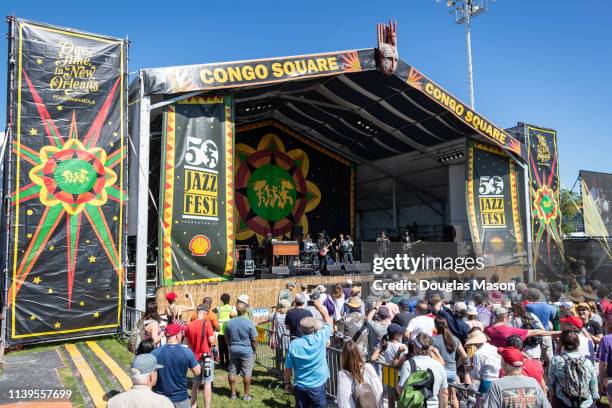 Carl Denson's Tiny Universe performs on the Congo Square Stage during the New Orleans Jazz and Heritage Festival 2019 50th Anniversary at Fair...