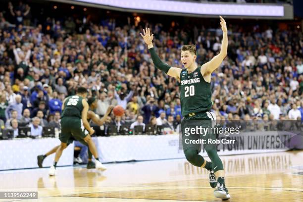 Matt McQuaid of the Michigan State Spartans celebrates after defeating the Duke Blue Devils in the East Regional game of the 2019 NCAA Men's...