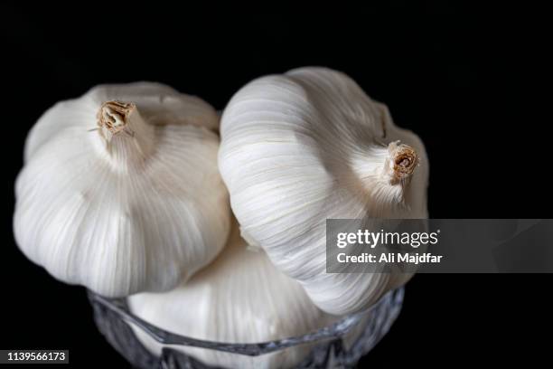 garlic bulb - nowruz stock pictures, royalty-free photos & images