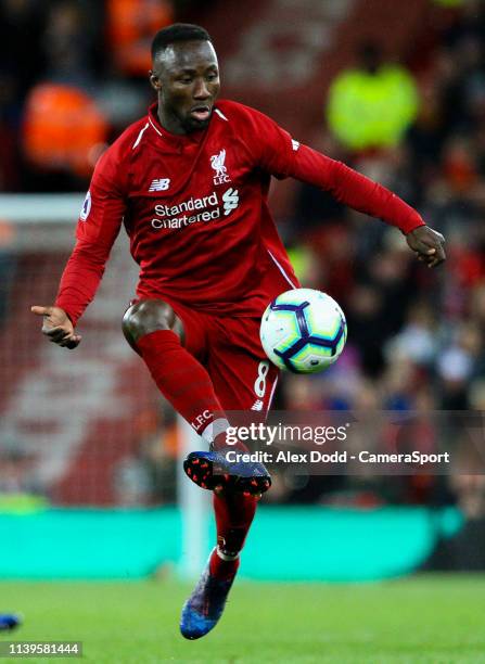 Liverpool's Naby Keita in action during the Premier League match between Liverpool FC and Huddersfield Town at Anfield on April 26, 2019 in...