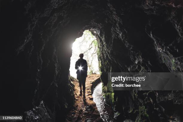 levada walk on madeira island - flashlight-cave stock pictures, royalty-free photos & images