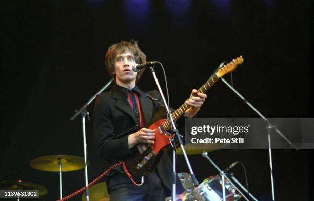 Wilko Johnson performs on stage at The Reading Festival on August 24th, 1979 in Reading, Berkshire, England.