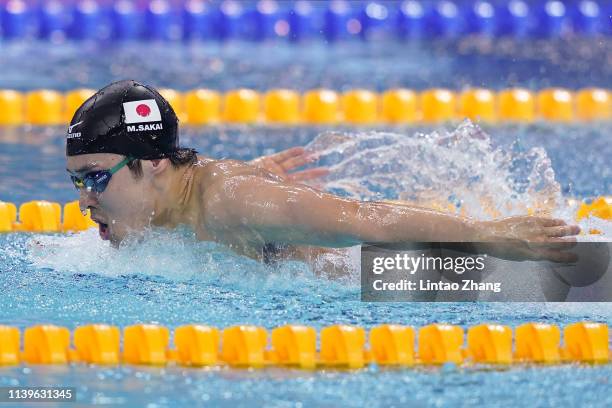 Masato Sakai of Japan competes in the Men's 200m Butterfly final during the FINA Champions Swim Series - Guangzhou at Guangdong Olymipic Center on...