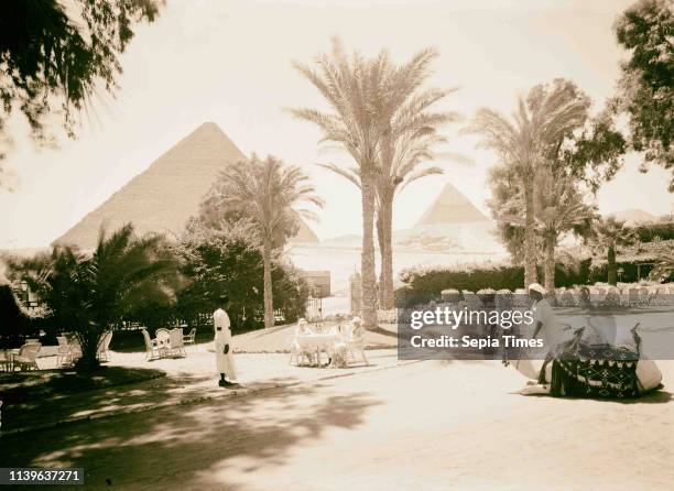 Egypt. Cairo. Hotels. Mena House. Front garden with the two pyramids as background. 1934, Egypt, Cairo