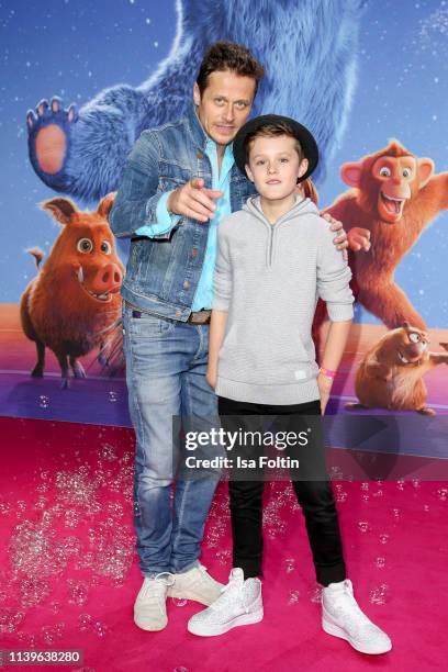 German actor Roman Knizka and his son Leo Knizka attend the "Willkommen im Wunder Park" premiere at Kino in der Kulturbrauerei on March 31, 2019 in...