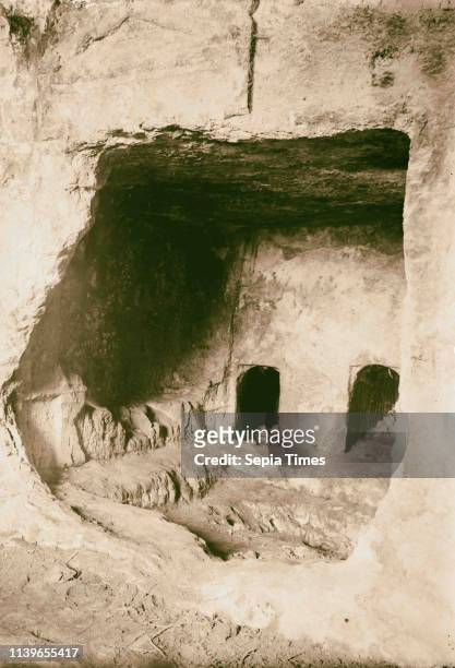 Valleys of Jehoshaphat and Hinnom. A rock-hewn tomb at Akeldama. Int[erior] & loculi. 1920, Jerusalem