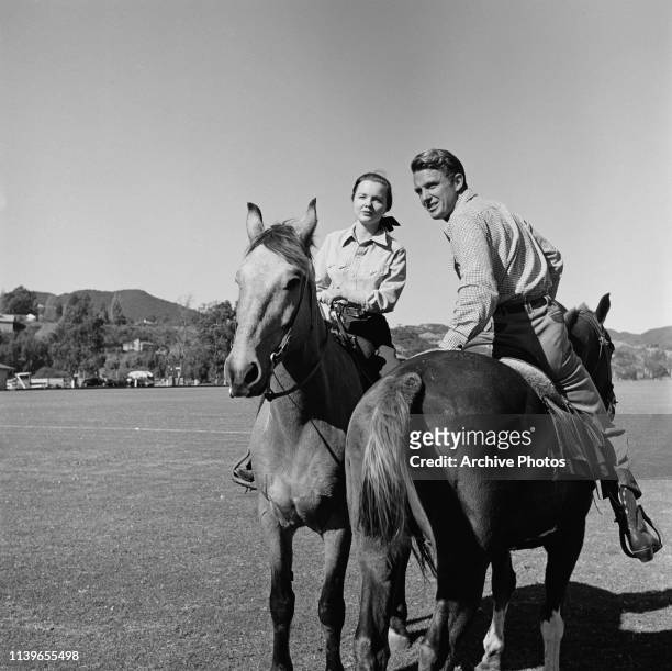 American actors Wanda Hendrix And Robert Stack on horseback, circa 1955. Hendrix married Stack's brother James in 1954.