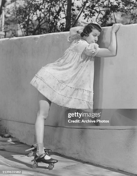 American actress, singer and comedian Fanny Brice on roller skates as her character Baby Snooks, circa 1945.