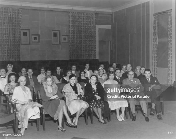 Metro-Goldwyn-Mayer stars gather in a projection room at the MGM studios for a screening, 1931. From left to right , Lilian Bond, Edwina Booth, Anita...