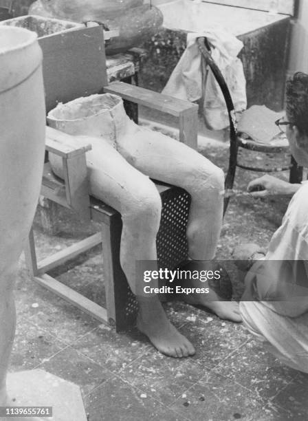 Pair of legs and feet for the waxwork of Caryl Chessman in the workshop of Madame Tussauds in London, circa 1960. Chessman was executed in the gas...