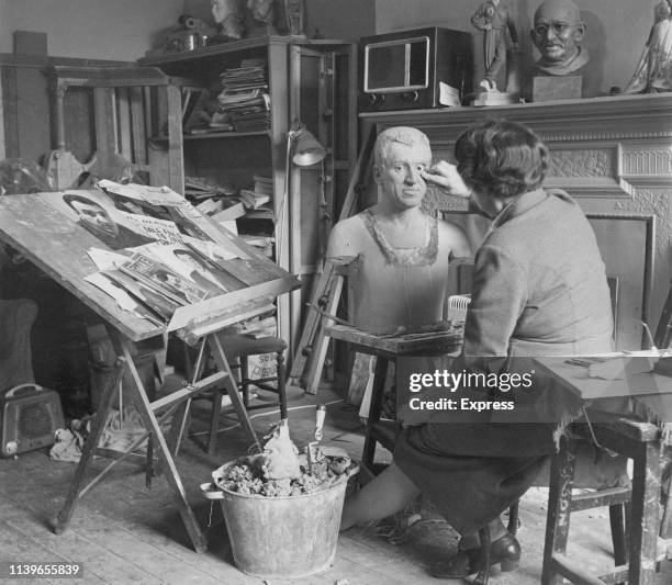 Waxwork of Caryl Chessman being sculpted for the Chamber of Horrors at Madame Tussauds in London, circa 1960. Chessman was executed in the gas...