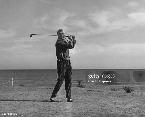 The Duke of Windsor playing golf during a holiday at Guadalmina in Spain, 30th January 1962. He is playing a match against racehorse owner Count...