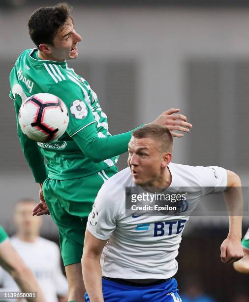 Tony Sunic of FC Dinamo Moscow and Zoran Nizic of FC Akhmat Grozny vie for the ball during the Russian Premier League match between FC Dinamo Moscow...