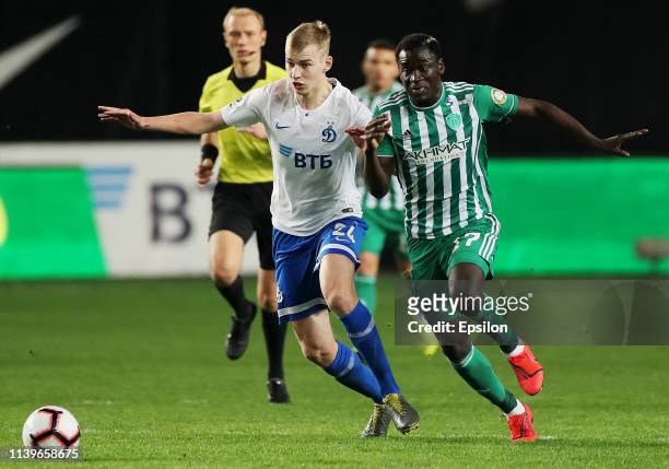 Zd of FC Dinamo Moscow and zah of FC Akhmat Grozny vie for the ball during the Russian Premier League match between FC Dinamo Moscow and FC Akhmat...