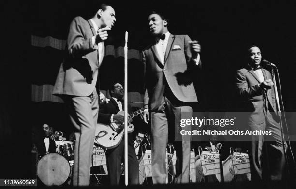 American doo-wop vocal group The Drifters perform at the Apollo Theater in New York City, 1964.