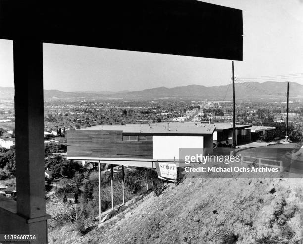 Stilt house designed by architect Richard J. Neutra on a hillside in Sherman Oaks, Los Angeles, California, circa 1965. These houses, built on...