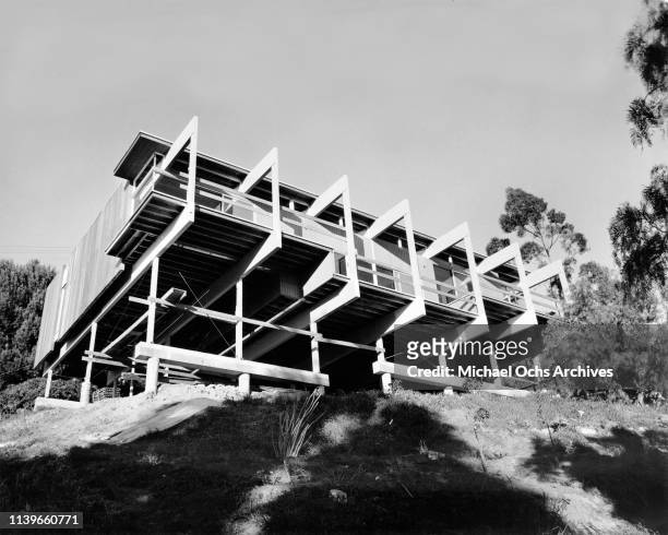 Modernist stilt house designed by architect Richard J. Neutra on a hillside in Sherman Oaks, Los Angeles, California, circa 1965. These houses, built...