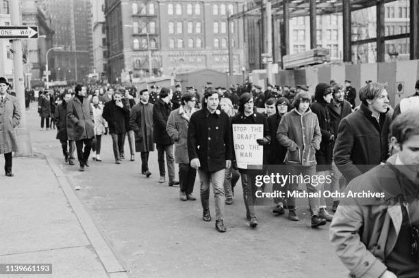 Members of the Student Mobilization Committee protesting outside the Armed Forces Induction Centre at 39 Whitehall Street in New York City on 'Stop...
