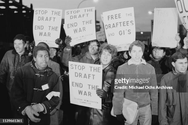 Members of the Student Mobilization Committee protesting outside the Armed Forces Induction Centre at 39 Whitehall Street in New York City on 'Stop...