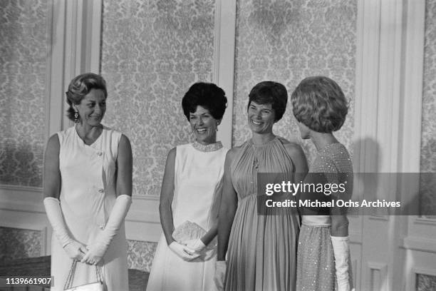 First Lady Pat Nixon and President Richard Nixon host a dinner at the Century Plaza Hotel in Los Angeles for the Apollo 11 astronauts, after their...