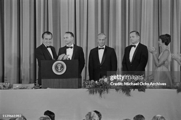 President Richard Nixon hosts a dinner at the Century Plaza Hotel in Los Angeles for the Apollo 11 astronauts, after their historic lunar landing...