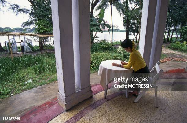 The world of General Than Shwe, the Burmese dictator In Yangon, Myanmar In 1996-Archive photo of nobel price winner Aung San Suu Kyi while in house...