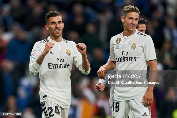 Dani Ceballos of Real Madrid of Real Madrid celebrates a goal with Karim Benzema of frame during the La Liga match between Real Madrid CF and SD...