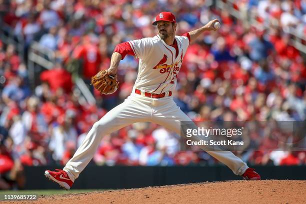 Andrew Miller of the St. Louis Cardinals pitches during the eighth inning against the Cincinnati Reds at Busch Stadium on April 27, 2019 in St....