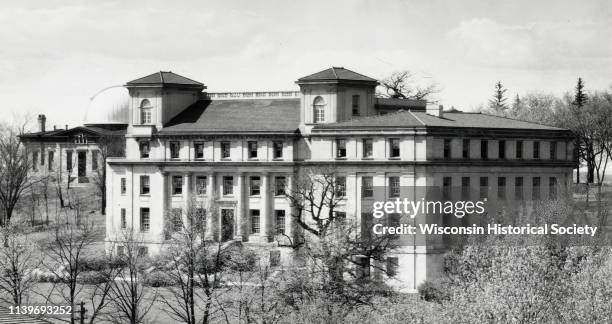 Home Economics building on the University of Wisconsin-Madison campus, Madison, Wisconsin, 1922. The Washburn Observatory is on the hill behind.