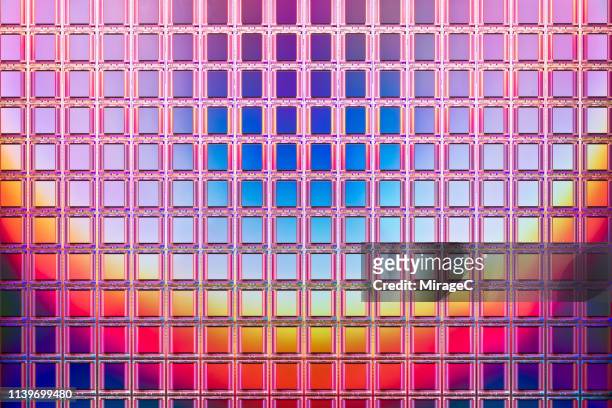 abundance of camera cmos on silicon wafer - computer wafer stock pictures, royalty-free photos & images