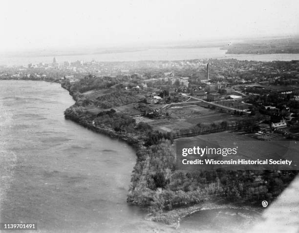 Aerial view from above Madison's Picnic Point towards the University of Wisconsin-Madison campus, downtown Madison, and Lake Monona, Madison,...