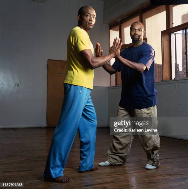 Choreographers Bill T. Jones and Ronald K. Brown pose for a joint portrait on June 17, 2000 in New York City, New York.