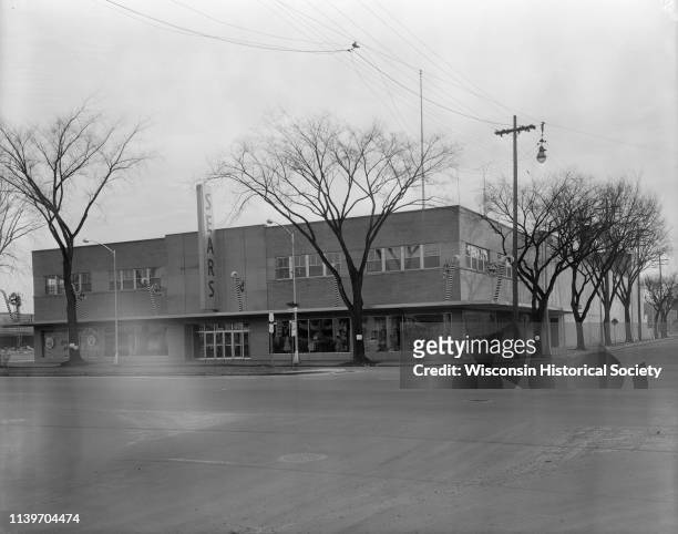 Exterior view of Sears Roebuck and Company store at 1101 East Washington Avenue, with Christmas decorations, located on the corner of East Washington...