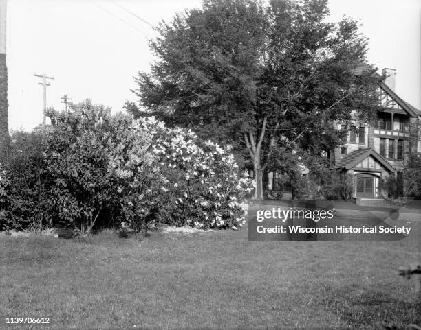 Exterior of Hiram Smith Hall dairy building with lilacs in foreground on the University of Wisconsin-Madison campus, Madison, Wisconsin, May 25,...