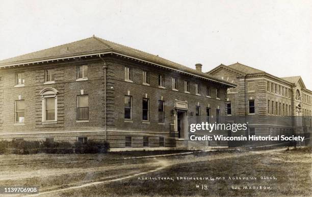 View of the exterior of the College of Agriculture, and Agronomy buildings on the University of Wisconsin-Madison campus, Madison, Wisconsin, 1910.