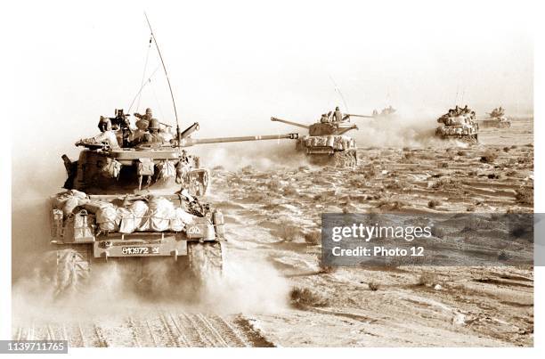 Israeli tanks speeding toward Egyptian military positions in the Sinai Peninsula during the Six Day War 1967 June 4.