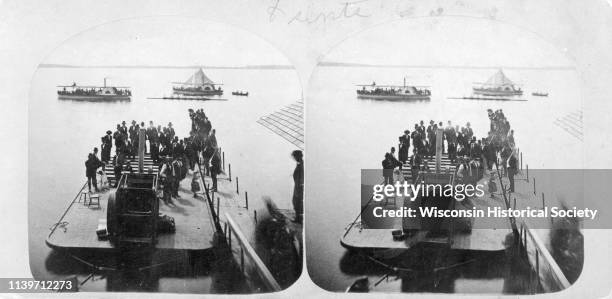 Stereo view of a lake scene in Madison, probably looking south on Lake Monona at a boat race in progress, Madison, Wisconsin, 1870. From the series...