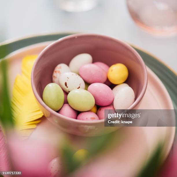easter table setting with cutlery plates dinnerware easter egg - easter candy stock pictures, royalty-free photos & images